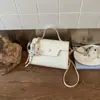 Bolso Pequeño Cuadrado Retro Simple para Mujer, Nuevo Bolso de Hombro Casual de Moda Primavera 2026, Bolso Cruzado Personalizado Estilo Ins