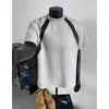 Verano 2025 Nuevo Top de Marca de Moda para Hombre Estilo Americano Diseño Holgado Gris Juventud Cuello Redondo Manga Corta Moderno
