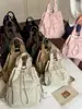 Transfronterizo 2026 Nueva Mochila Versátil con Cordón para Viajes Diarios Gran Capacidad Bolso de Mano para Hombro Cruzado Simple y Elegante