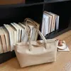 Bolso Tote de Cuero Suave Tipo Grano de Gran Capacidad Simple 2026 Nueva Moda de Primavera Bolso de Hombro Versátil para el Trabajo Bolso de Mujer
