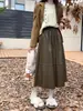 Saia de couro preta em linha A, nova coleção outono/inverno 2026 feminina, saia midi de couro PU de cintura alta, estilo casual, bodycon e evasê