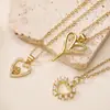 Collar con colgante de corazón hueco de circonita de cobre chapado en oro de 18 quilates, superventas transfronterizo europeo y americano Aogu para mujer, accesorio versátil de nicho