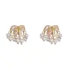 Amazon Moda Transfronteriza Pendientes de Metal Retro con Diseño Único de Fuegos Artificiales y Borla de Perlas, Pendientes Versátiles
