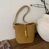Bolso de Mujer Estilo Niche Pedido Extranjero 2026 Nuevo Bolso Cubo de Moda Casual Bolso de Hombro Cruzado Retro para Viajes