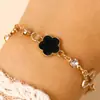 Conjunto de Collar y Pulsera con Colgante de Trébol Esmaltado de Estrella de Cuatro Puntas Incrustado de Diamantes de la Suerte Estilo de Alta Gama Moda Transfronteriza Europea y Americana