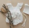 En stock comercio exterior ropa de algodón y lino para bebé primavera y verano versión coreana de mono de tirantes para bebé niña traje de escalada de manga volante envoltorio de pañal