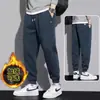 Pantalones deportivos para hombre con forro de polar, color liso, puño, pantalones casuales, nuevos pantalones deportivos cómodos de retazos para primavera/otoño