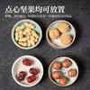 Elegante y sencillo plato de cerámica con forma de loto para casas de té, con nueces, frutas secas y bocadillos; adecuado para uso comercial en salones de té y salas de estar