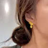 Explosiones del Libro Rojo Estilo Retro de Corte Fengqi Wutong Pendientes Nuevos Pendientes de Borla de Pétalo Exquisitos Dorados Estilo Chino Nuevo para Mujer