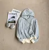 Cárdigan con capucha de punto a rayas casual estilo coreano con cordón, suave y holgado, versátil para otoño e invierno, sudadera para mujer