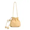 26 nuevos bolsos de hombro y cruzados para mujer, elegantes y versátiles, de estilo transfronterizo, bolso tipo cubo de alta gama, venta al por mayor de fábrica