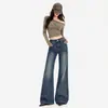 Jeans acampanados # Bordados color naranja joven con un bolsillo trasero, corte slim, favorecedores, desgastados, con caída fluida, modernos y versátiles