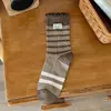 Calcetines de estilo coreano hasta la pantorrilla con bordes rizados y rayas para mujer, calcetines apilados de doble aguja para otoño e invierno, calcetines largos de algodón con etiquetas de tela para zapatos pequeños de cuero