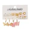 Pendientes de perlas transfronterizos nuevos, combinados con aros de aleación acrílica de estilo europeo y americano.