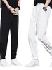 Calça masculina moderna transfronteiriça, estilo coreano, de alta qualidade, com caimento fluido, branca, modelagem solta, afunilada nos tornozelos, adequada para primavera e outono, calça masculina casual