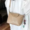 Bolso Femenino para Axila 2026 Nuevo Modelo de Verano, Popular y Exquisito Bolso de Hombro para el Trabajo, Bolso Cruzado Tipo Cubo para el Día a Día