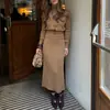 Conjunto de Suéter de Gola Alta Elegante e Versátil com Caimento Justo + Saia - Novo Estilo Outono e Inverno 2026 Europeu e Americano Transfronteiriço