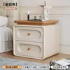 Mesita de Noche de Segunda Mano para Dormitorio del Hogar Modelo Nuevo 2026 Crema Lujo Ligero Gama Alta Madera Maciza Pequeño Gabinete de Almacenamiento de Mesita de Noche