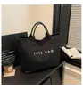 Bolsa de Ombro Grande Capacidade Transfronteiriça para Mulheres 2026 Novo Estilo de Nicho Bolsa Tote de Luxo Leve Bolsa de Mão Versátil da Moda