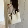 Bolsa Tote Tecida Grande Capacidade Estilo Coreano Feminina 2026 Nova Leve Luxuosa Nicho de Alta Qualidade Versátil para o Dia a Dia Bolsa de Ombro