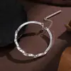 Transmissão ao vivo do Douyin: Pulseira aberta sólida ajustável com borla simples Mobius banhada a prata em cobre branco, um presente para uma namorada