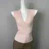 Ropa de mujer para comercio exterior, nuevo estilo coreano Dongdaemun, chaleco de punto sexy y seductor con cuello en V cruzado, corte ajustado para acentuar la figura