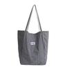 Bolsa de Ombro Listrada Reversível de Dupla Face Transfronteiriça Bolsa Tote de Grande Capacidade Bolsa de Lona Estudantil Bordada de Alta Qualidade Bolsa de Trabalho