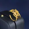 Moda Moderna Europea y Americana Personalidad Lujo Ligero Cuerda Nudosa Tachonada de Diamantes Forma de C Nudo Calabaza Aretes de Botón