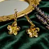 Los Conjuntos de Joyería Florales de Moda Transfronterizos Europeos y Americanos Son de Venta Caliente: Collares con Colgantes de Oro, Pulseras, Anillos y Aretes