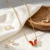 Fabricante de conjunto de joyería de mariposa concha estilo francés transfronterizo, combinación de collar, pulsera y pendientes de nicho de alta gama para mujer