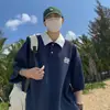 Camiseta tipo polo de dos piezas falsas de manga corta para hombre, de verano, moderna, estilo retro universitario americano, holgada, camiseta de manga corta