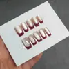 Arte de Uñas Ojo de Gato Estilo Francés Rojo Puntas de Uñas Portátiles Transfronterizas Nuevas Puntas de Uñas Cuadradas Medias Tiras de Uñas Pre-hechas XS/S/M