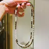 Otoño e Invierno Alta Calidad Maillard Natural Piedra Ojo de Tigre Alto Brillo Blanco Frío Largo Perla Swarovski Cadena para Suéter Collar Cadena de Clavícula