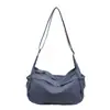 Bolsa de lona transfronteriza para mujer, nuevo modelo 2026, bolso de hombro casual versátil, bolso cruzado deportivo ligero de moda para el trabajo