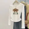 Camiseta feminina de algodão puro estilo coreano, acinturada, ombros normais, gola redonda, manga longa, design único, estilo casual, rejuvenescedora, top base versátil