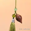 Palo de rosa amarillo africano tallado hueco calabaza sachet jarrón colgante difusor adorno llavero colgante