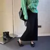 Falda de ganchillo calada de alta resistencia para mujer, nuevo estilo coreano otoño e invierno 2026, falda recta de felpa de alta gama de longitud media