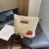 Bolso Tejido Calado Estilo Nuevo Primavera 2026 Transfronterizo para Mujer, Bolso Cubo para Vacaciones en la Playa Viajes, Bolso de Hombro Único