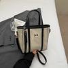 Bolsa Bucket Color-Blocking Tendência 2026 Nova Coleção Primavera Moda Coreana Bolsa de Ombro com Toque de Luxo e Design Cruzado Único