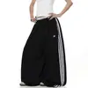 Comercio exterior transfronterizo calle alta americana retro a rayas retazos gris pantalones de chándal de pierna recta unisex deportivos holgados pantalones de pierna ancha