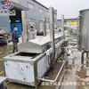 Pez tambor amarillo hierba de carpa nueva línea de montaje de fritura calentamiento eléctrico carne crujiente pequeña filete de raíz de loto albóndigas de pescado línea de producción de fritura