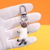 Colgante Hebilla Colgante Gato Lindo Tridimensional Anillo Cadena Llavero Gato Acostado Colgante Ropa Teléfono Móvil Venta al por Mayor Transfronteriza