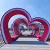 Punto Fotográfico de Túnel en Forma de Corazón Rosa, Instalación de Asientos de Túnel en Forma de Corazón junto al Mar, Atracción Creativa Famosa en Internet en Forma de Corazón junto al Mar