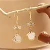 Han Feng ins brincos de pedra olho de gato amor laço zircônia oca brincos brincos meninas desejo puro joias atacado
