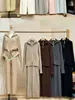 Conjunto de Punto Estilo Perezoso para Mujer 2026 Otoño/Invierno Nueva Llegada Suéter con Solapa y Doble Cremallera + Pantalones Rectos de Pierna Ancha Conjunto de Dos Piezas