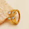 Anillo abierto geométrico de doble diamante europeo y americano, anillo de oro con circonita de múltiples diamantes irregulares de lujo ligero, diseño de nicho, versátil para mujeres