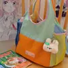Bolsa tote com design de nicho, bolsa feminina casual com design de nicho, leve, color blocking, bolsa de mão personalizada para estudantes 2026 para mulheres