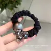 Diseño minimalista, scrunchie de cristal con cuentas grises, banda de goma de alta elasticidad para coleta baja, anillo para el pelo para mujer