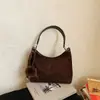 2026 Nuevo Estilo Coreano Bolso de Hombro Versátil Retro Casual para Mujer Bolso de Mano Bestseller Transfronterizo de Moda Gamuza