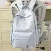 Mochila de Tarjeta Oso Suave Lindo Estampado Completo Rayas Verticales Rosa Melocotón Niebla Suave Estilo Suave Femenino Fiesta Estudiantil Mochila Dulce
